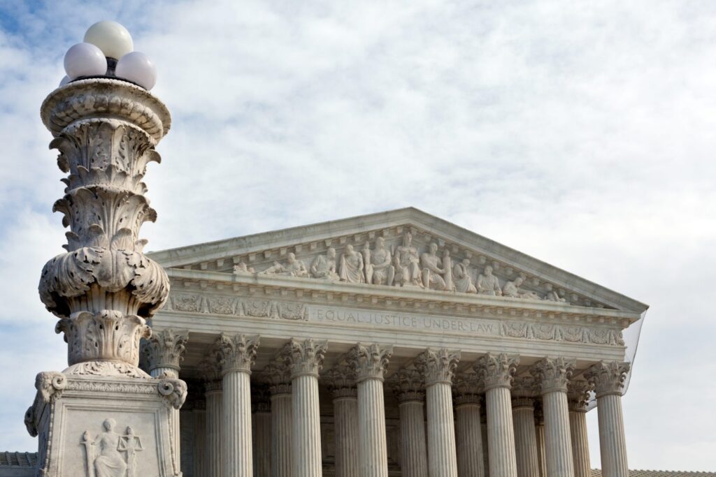 The outside of the US Supreme Court. Representing how one can benefit from calling a Portland criminal defense attorney.