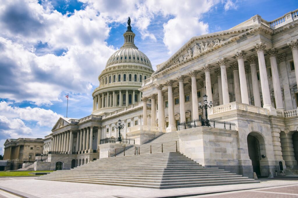 An outside picture of the US Congress and the Supreme Court, representing how one can benefit from calling a Portland criminal defense lawyer.
