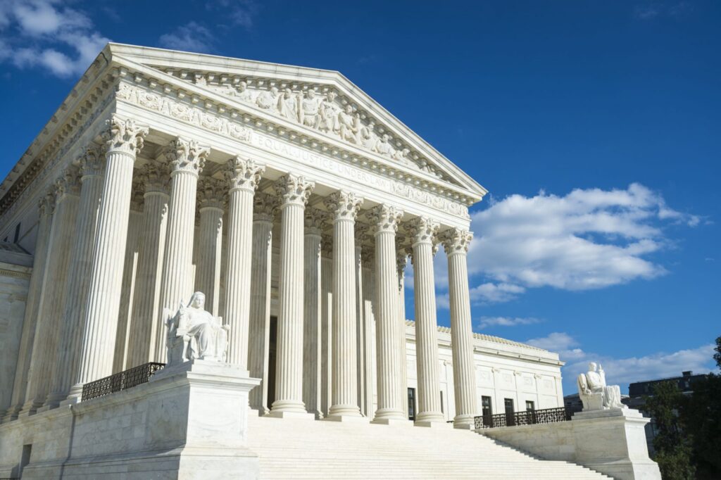 An outside picture of the Supreme Court, representing how one can benefit from calling a Portland criminal defense lawyer.