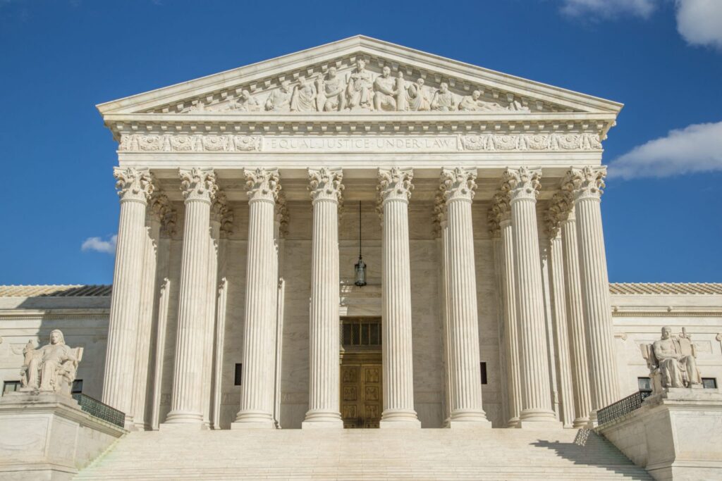 Wide picture of the outside of the US Supreme Court, representing how one can benefit from calling a Portland criminal defense attorney.