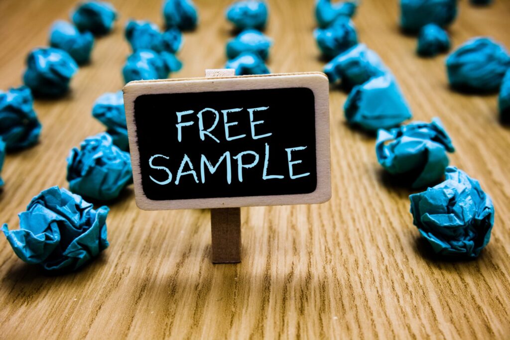 Smalls samples on a table with a sign saying "Free Samples", representing how one can benefit from calling a Portland criminal defense lawyer.