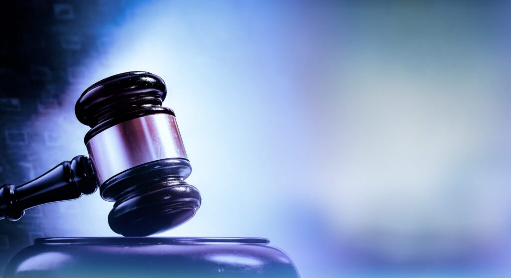 A judge's gavel and block, representing how one can benefit from calling a Portland criminal defense lawyer.