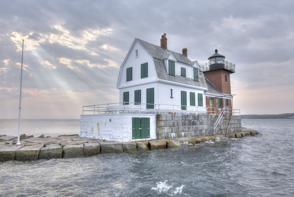 Rockland Maine Criminal Defense Attorneys portrayed by an old lighthouse in Maine