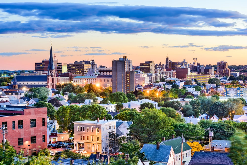 Portland Maine OUI DUI Lawyers Southern Maine portrayed by the Portland Maine skyline as the sun is setting.