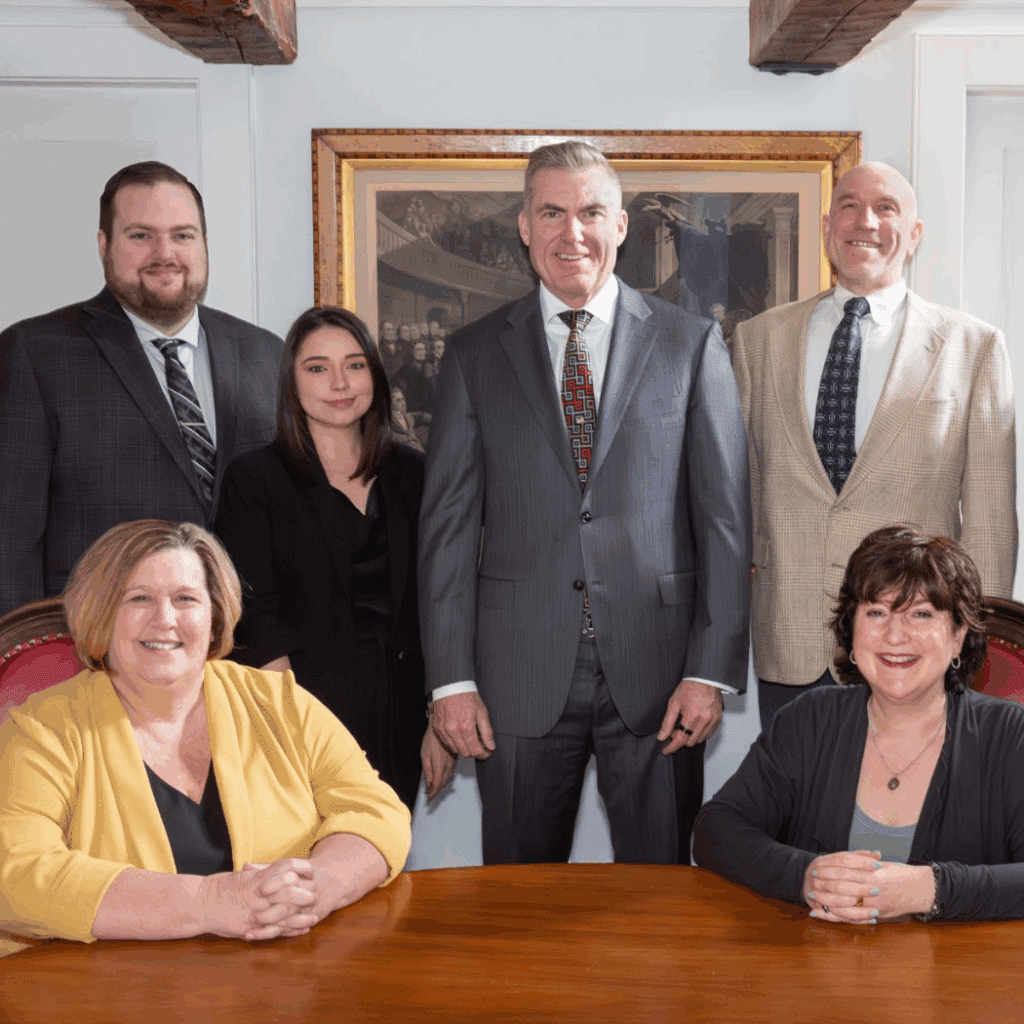 The Maine Criminal Defense Group Team Photo Round Table